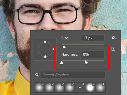 Setting the brush hardness to 0 percent.