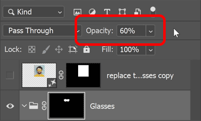 Lowering the opacity of the layer group.