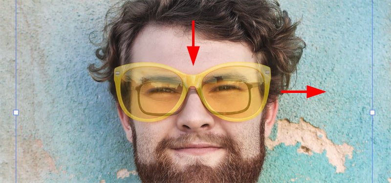 Using the arrow keys to nudge the sunglasses into position.