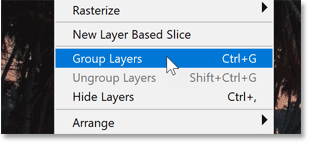 Choosing Group Layers from the Layer menu.