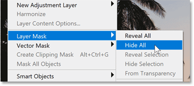 Adding a layer mask that will hide the contents of the group.